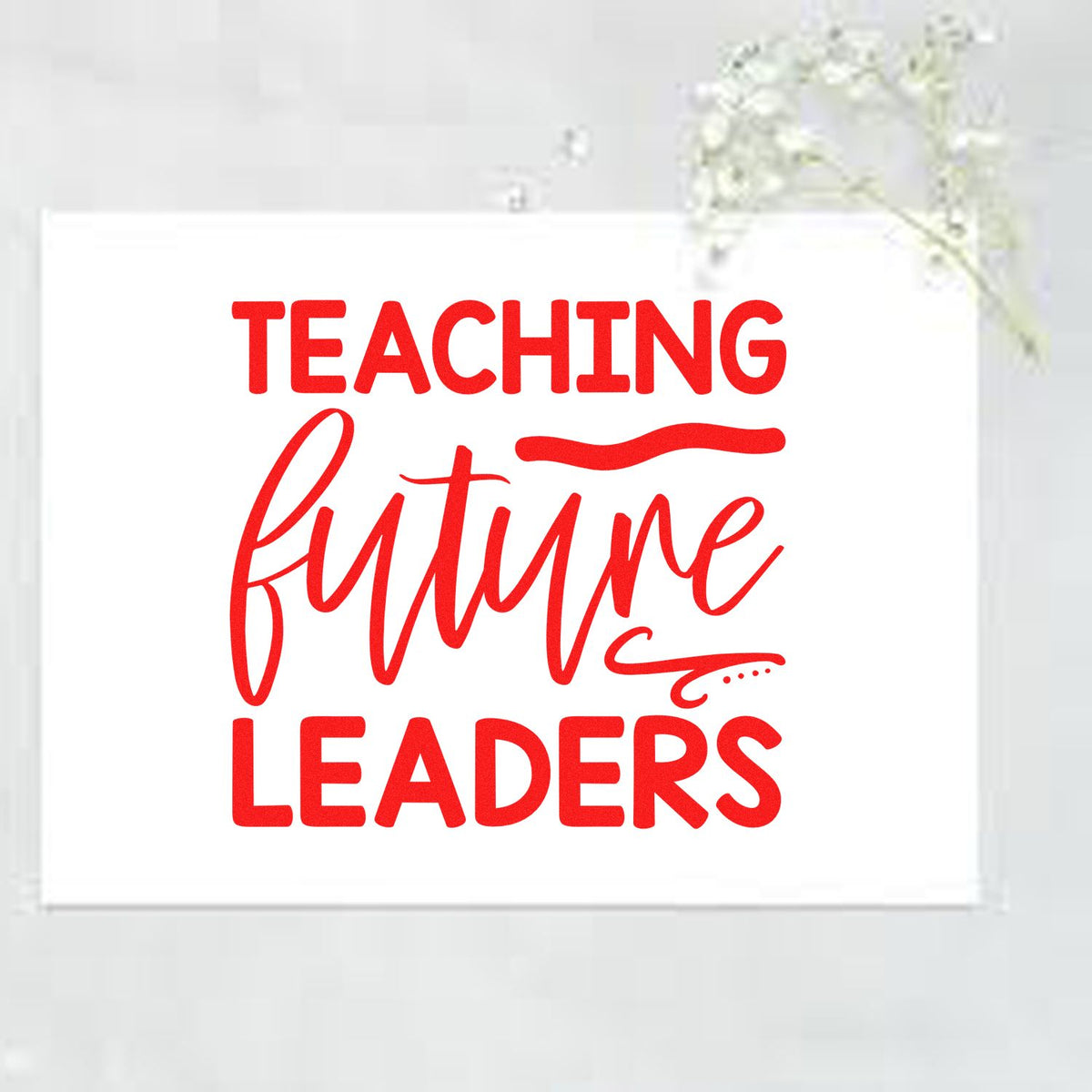 Red teaching future leaders stamp and seal on a white square, with bold and script lettering.
