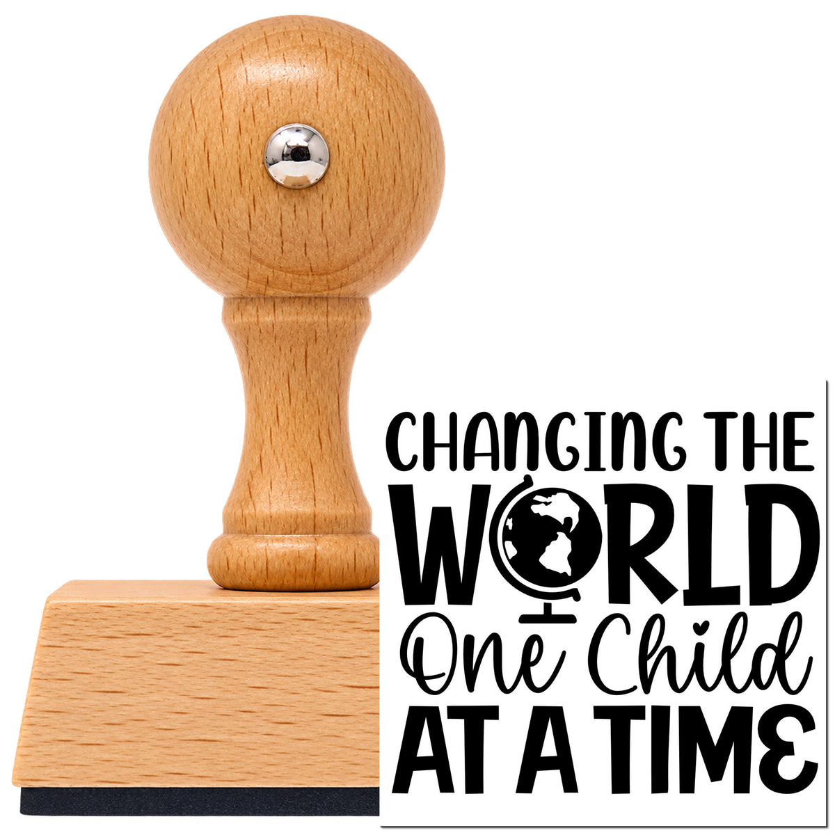 Vintage Pro beech wood stamp with a round knob handle, shown with its black Changing World One Child imprint on white.
