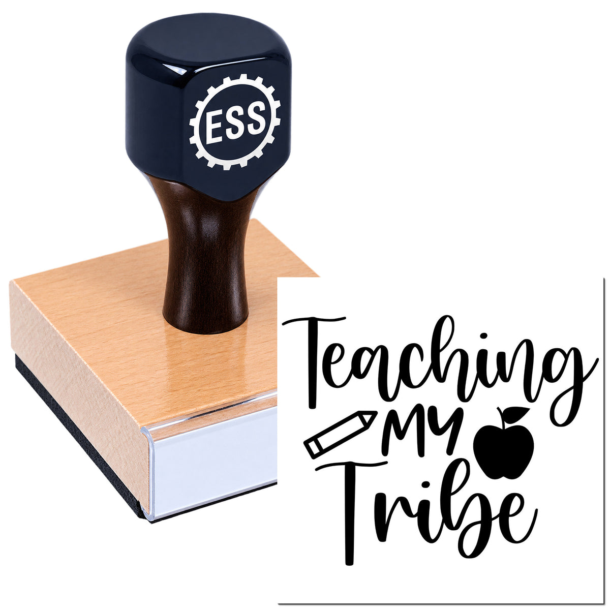 Navy ESS rubber stamp seal on a pink wooden block, with black Teaching My Tribe logo and apple icon.