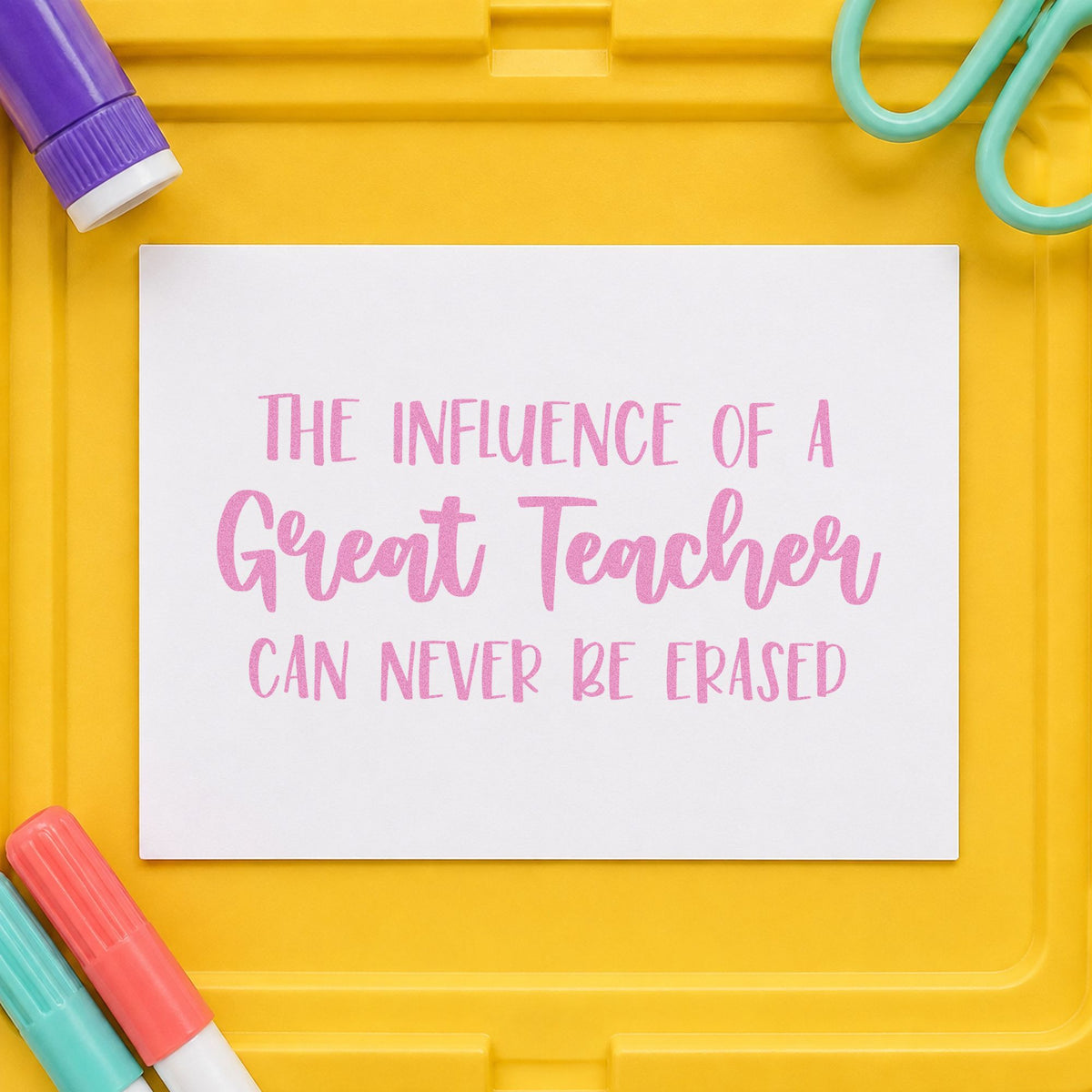 Great Teacher Lasting Influence craft stamp in purple ink on cardstock, an easy option for tribute book tags.