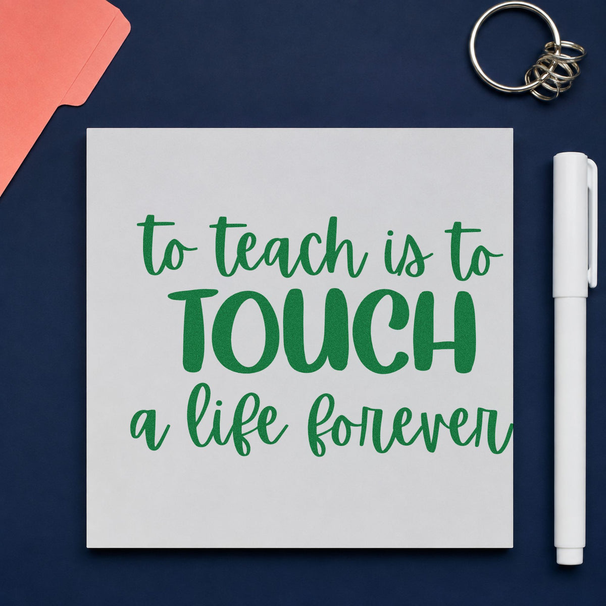 Teach Touch Life Forever craft stamp imprint in green ink on a handmade project, one idea being foundation pages.
