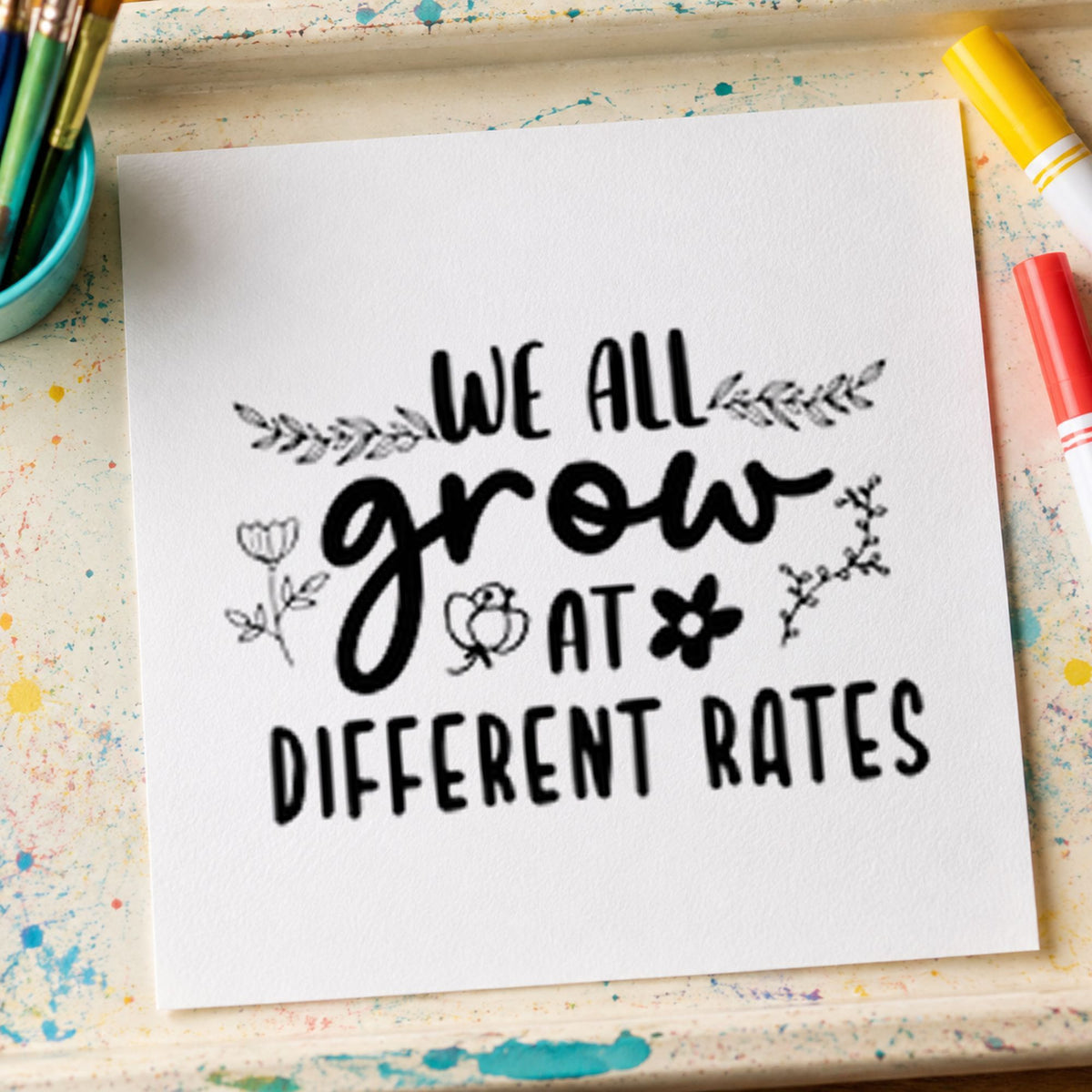 We Grow At Different Rates rubber stamp printed in black ink, ready for different rates cards and similar paper crafts.