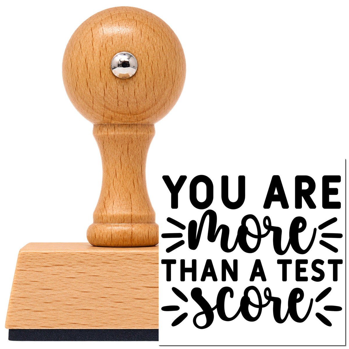 Vintage Pro beech wood stamp with a round knob handle, shown with its black More Than Test Score imprint on white.