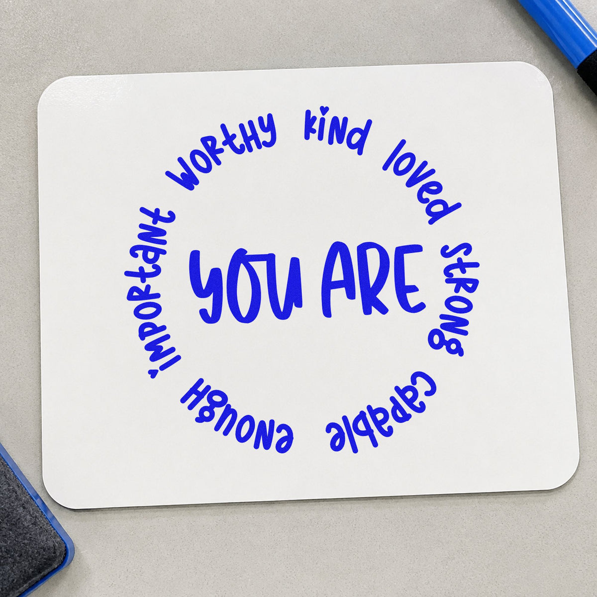 You Are Positive Qualities craft stamp in blue ink on cardstock, an easy option for round cushion panels.
