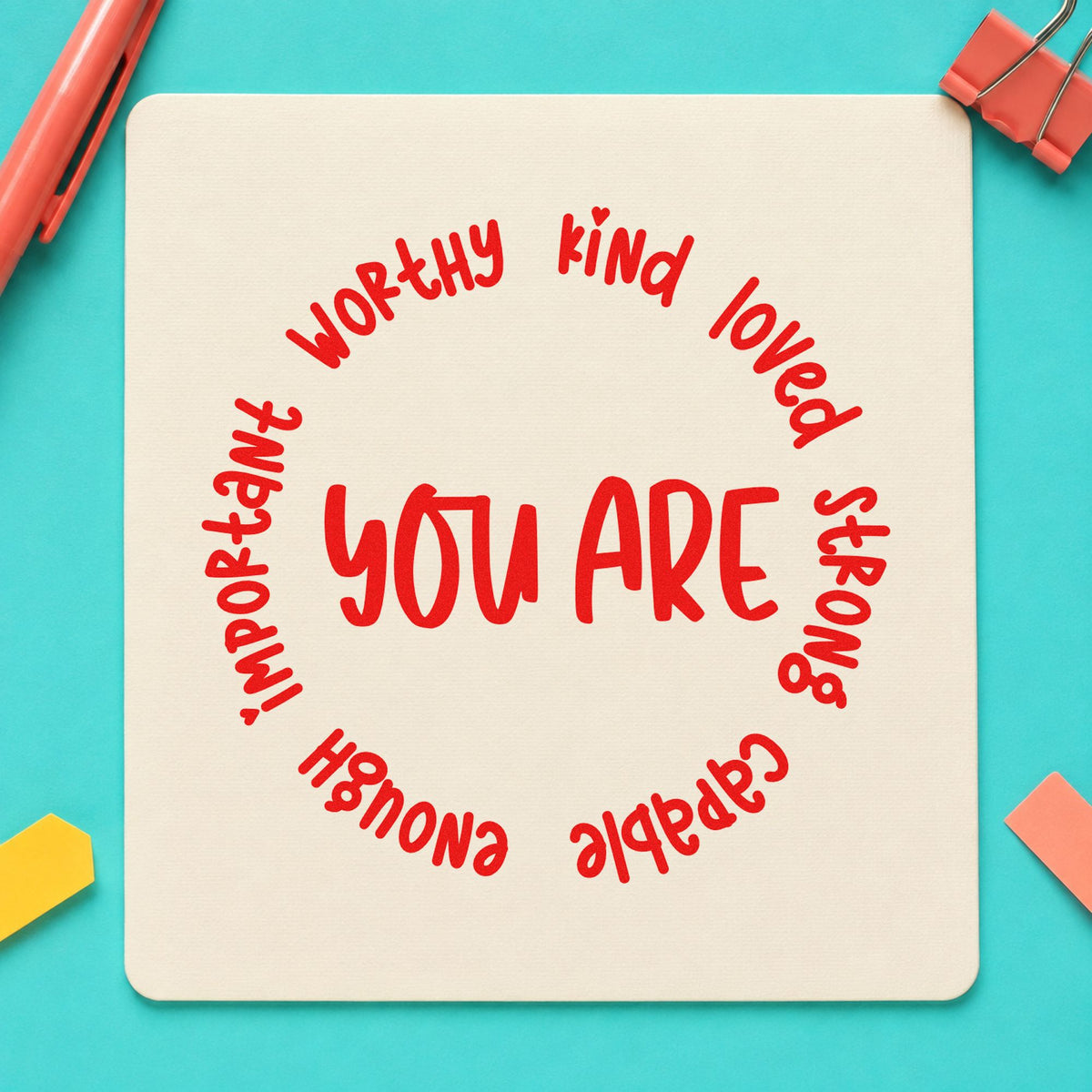 You Are Positive Qualities rubber stamp shown in red ink, stamped for projects such as transition day notes.