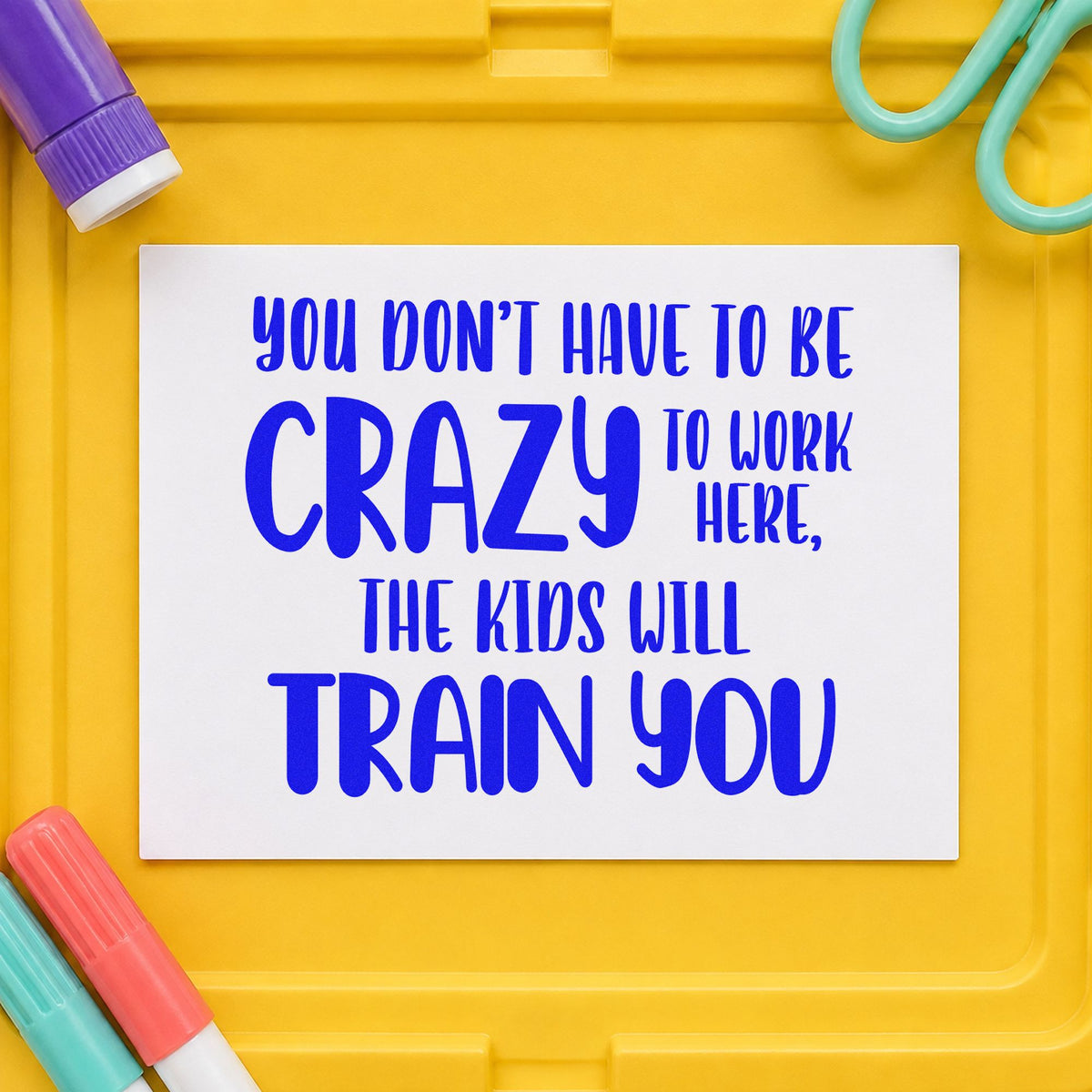 Crazy Kids Will Train You craft stamp imprinted in blue ink on paper, a design suited to welcome pack seals.