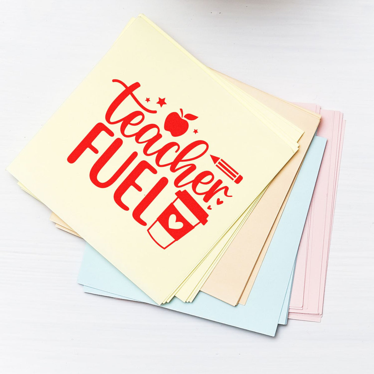 Pastel stamp sheets with red Teacher Fuel design, apple, pencil and coffee cup for teacher seal products.