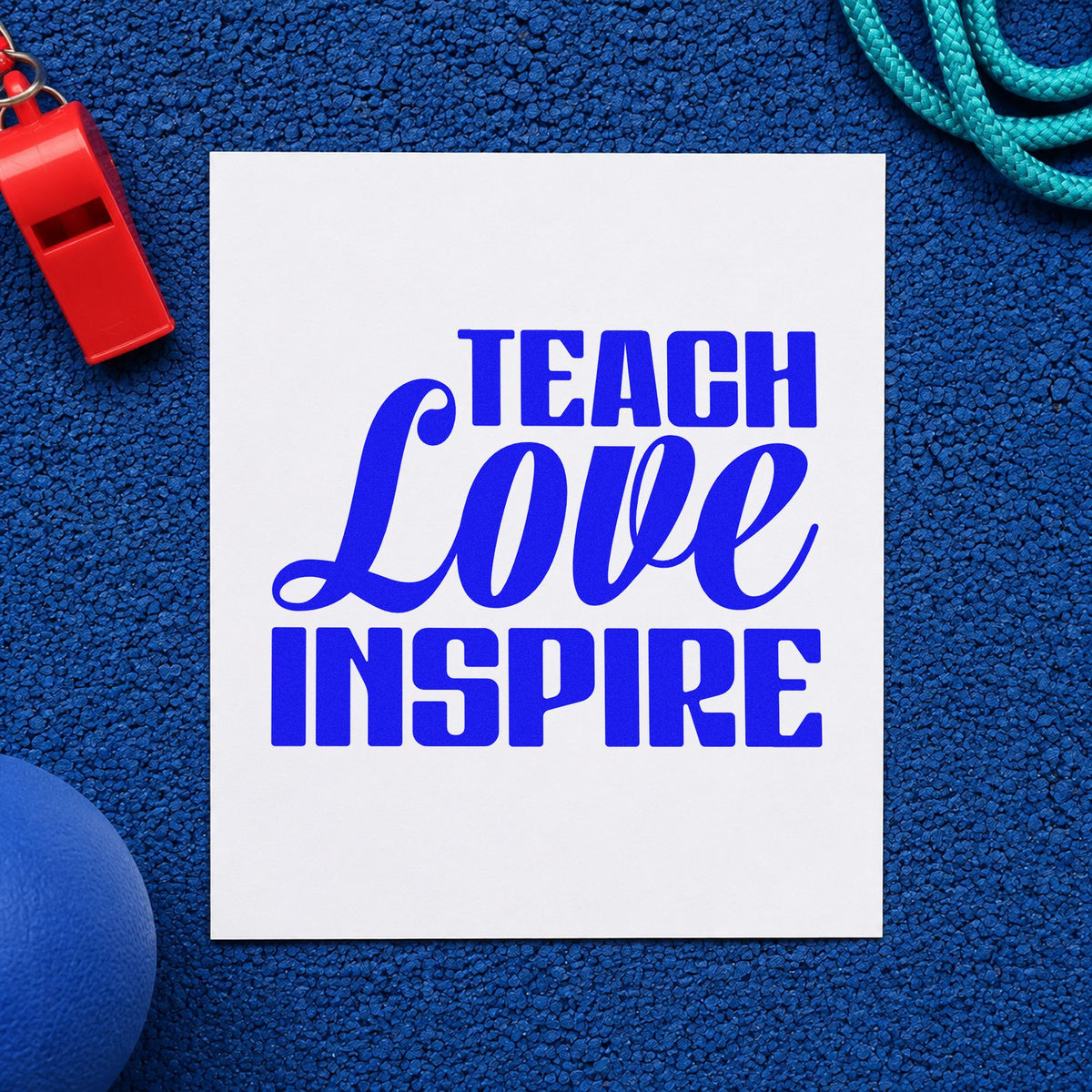Teach Love Inspire Bold Script craft stamp in blue ink on cardstock, an easy option for napkin corner panels.