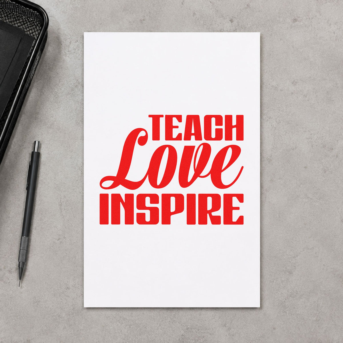 Teach Love Inspire Bold Script rubber stamp shown in red ink, stamped for projects such as toast speech notes.