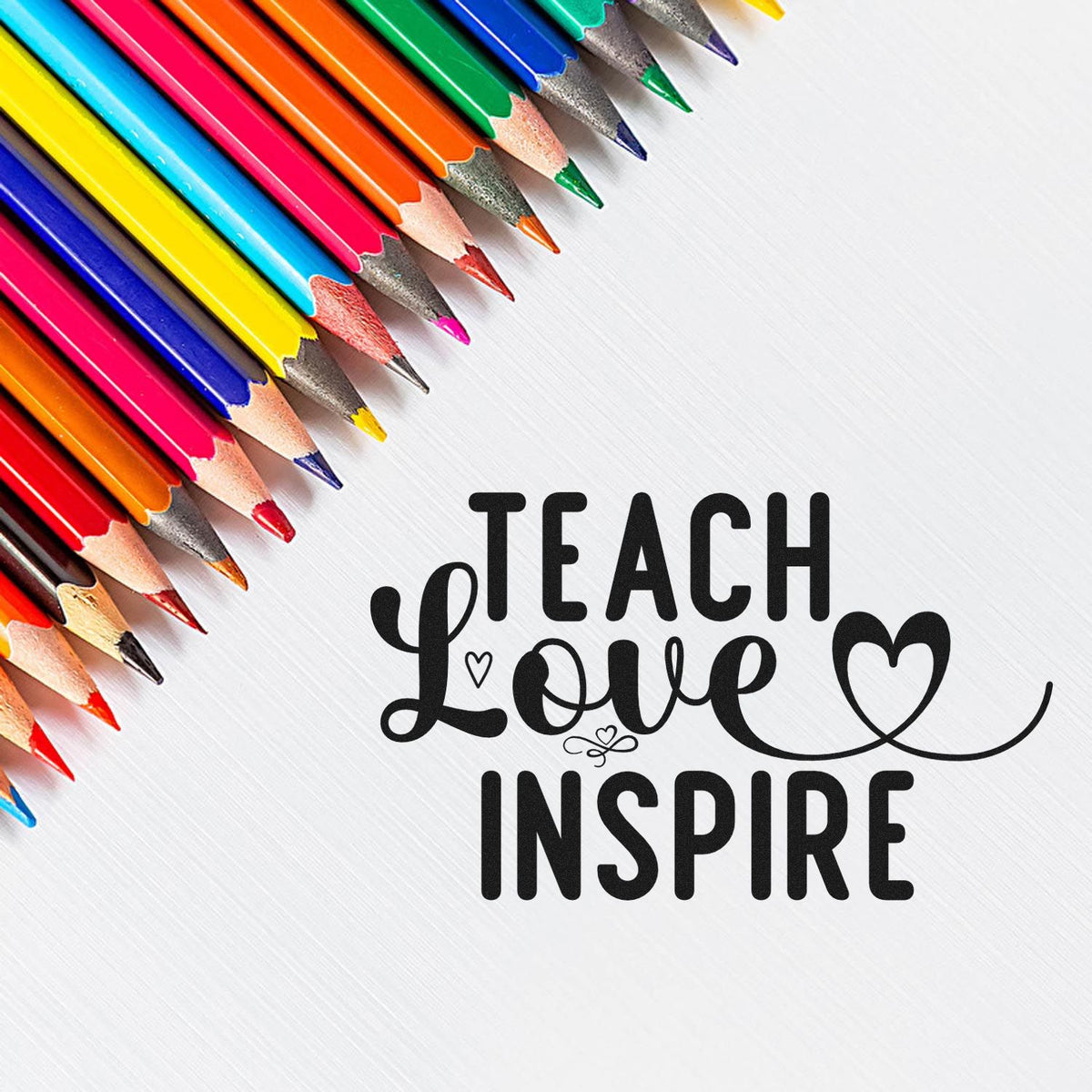 Teach Love Inspire stamp and seal design with colorful pencils and black lettering on white background