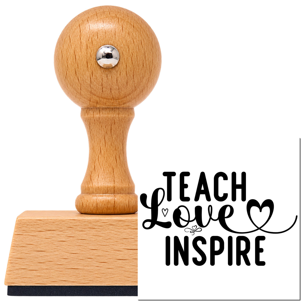 Vintage Pro beech wood stamp with a round knob handle, shown with its black Teach Love Inspire Heart Flourished Lettering imprint on white.