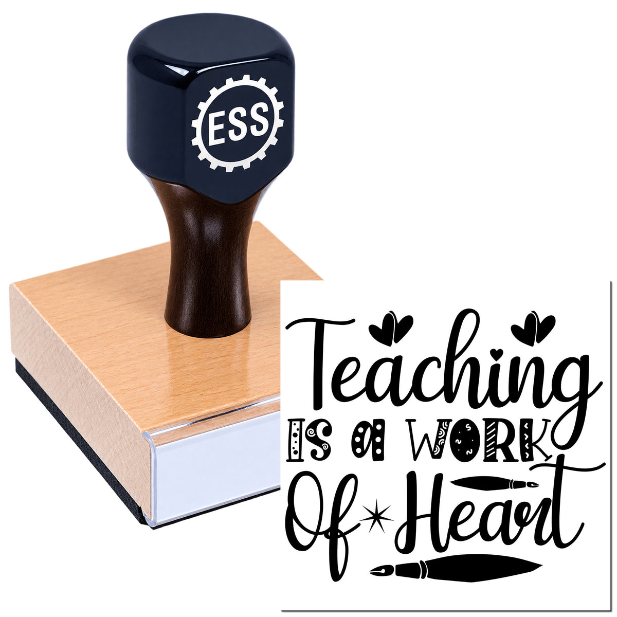 Black ESS teacher stamp with square pink rubber seal block and "Teaching Is a Work of Heart" design on white background.