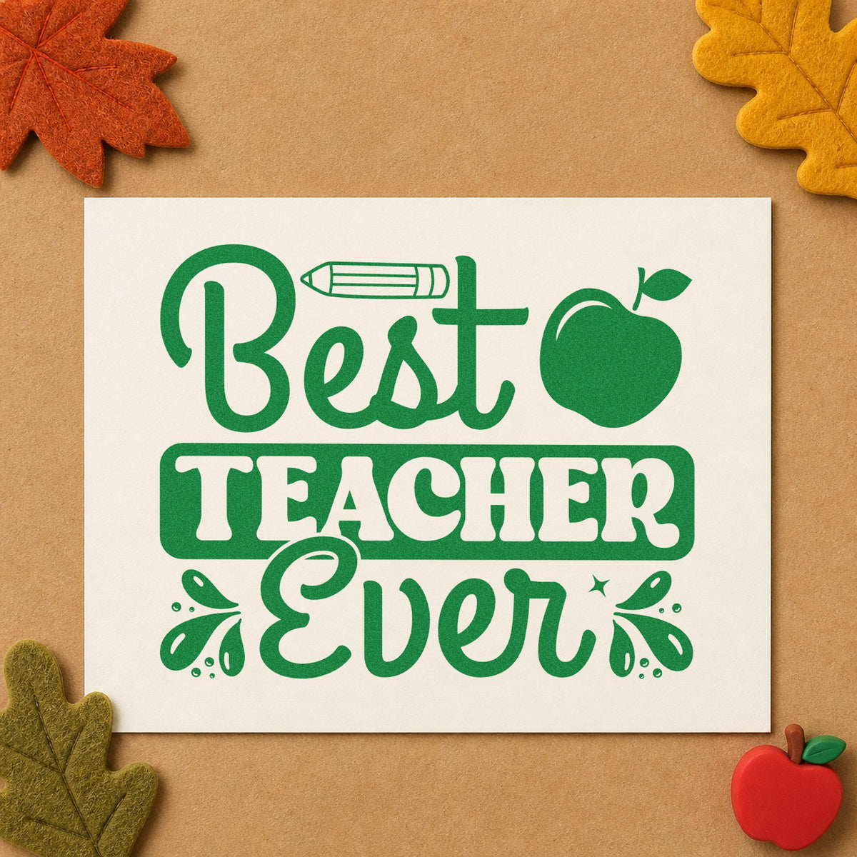 Best Teacher Ever Apple craft stamp imprint in green ink on a handmade project, one idea being framed hall banner.