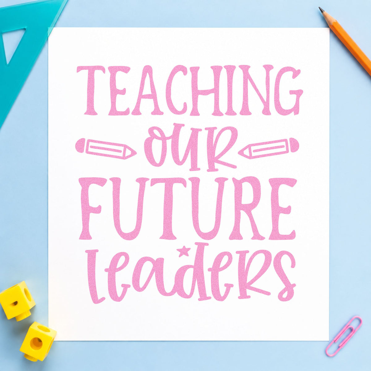 Teaching Our Future Leaders craft stamp in purple ink on cardstock, an easy option for placement gift tags.