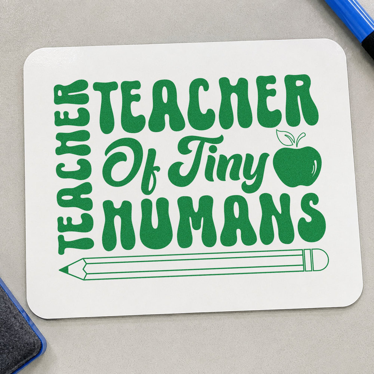 Teacher Of Tiny Humans Pencil craft stamp imprint in green ink on a handmade project, one idea being observation pages.