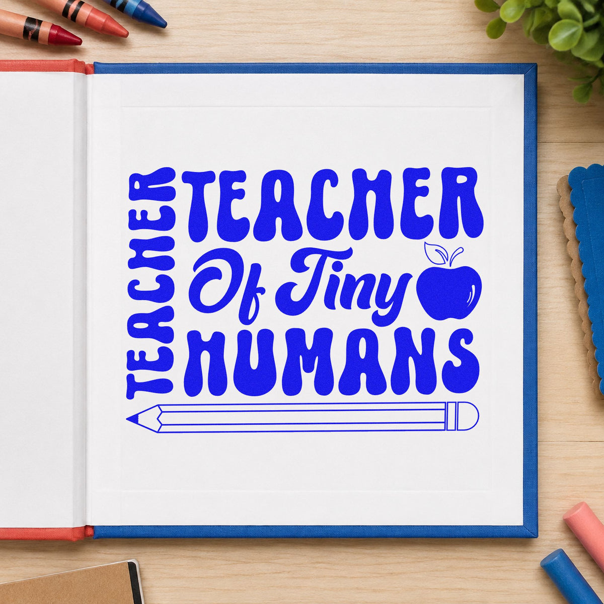 Teacher Of Tiny Humans Pencil craft stamp imprinted in blue ink on paper, a design suited to nappy bag seals.