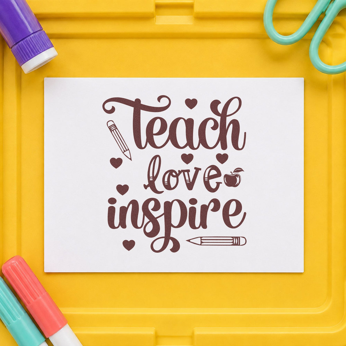 Teach Love Inspire Hearts rubber stamp printed in brown ink, ready for drawer front labels and similar paper crafts.