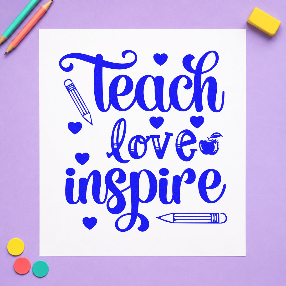 Teach Love Inspire Hearts craft stamp imprinted in blue ink on paper, a design suited to bundle box seals.
