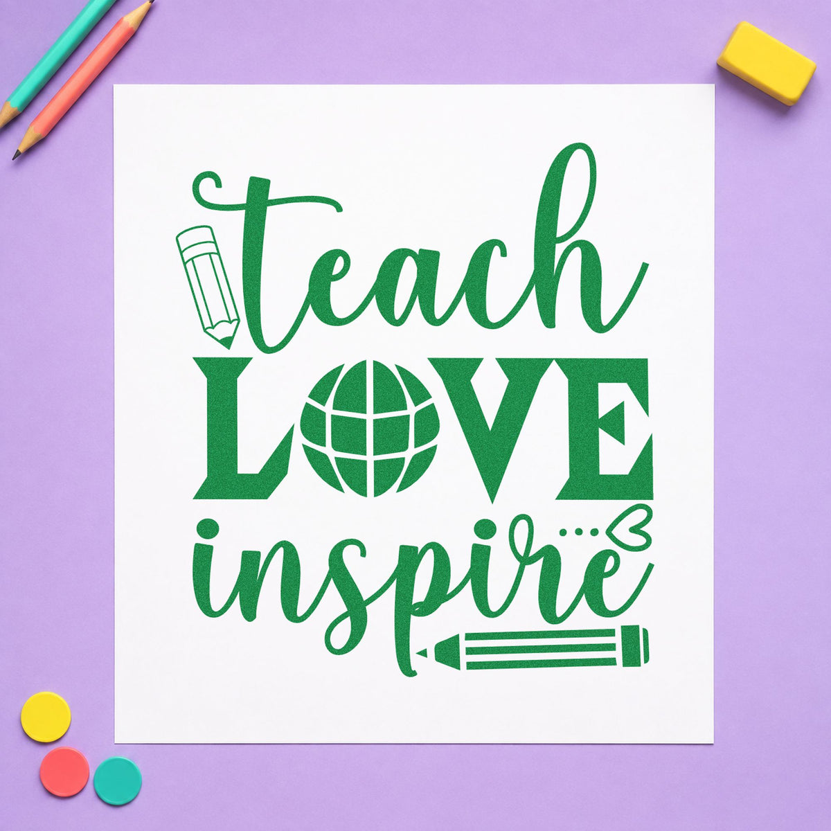 Teach Love Inspire Globe craft stamp imprint in green ink on a handmade project, one idea being itinerary pages.