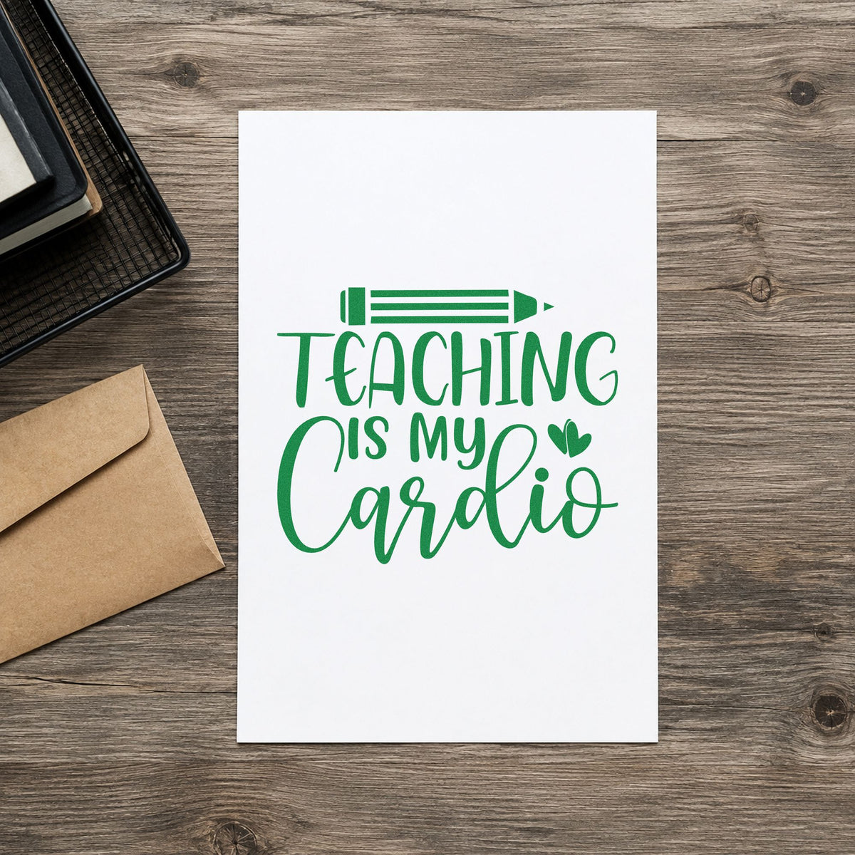 Teaching Is My Cardio craft stamp imprint in green ink on a handmade project, one idea being distance log pages.