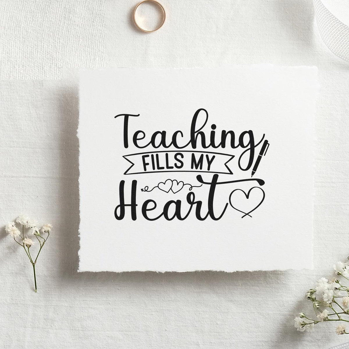 Black teaching stamp and seal design on white paper, with hearts, pencil icon, and the words Teaching fills my heart