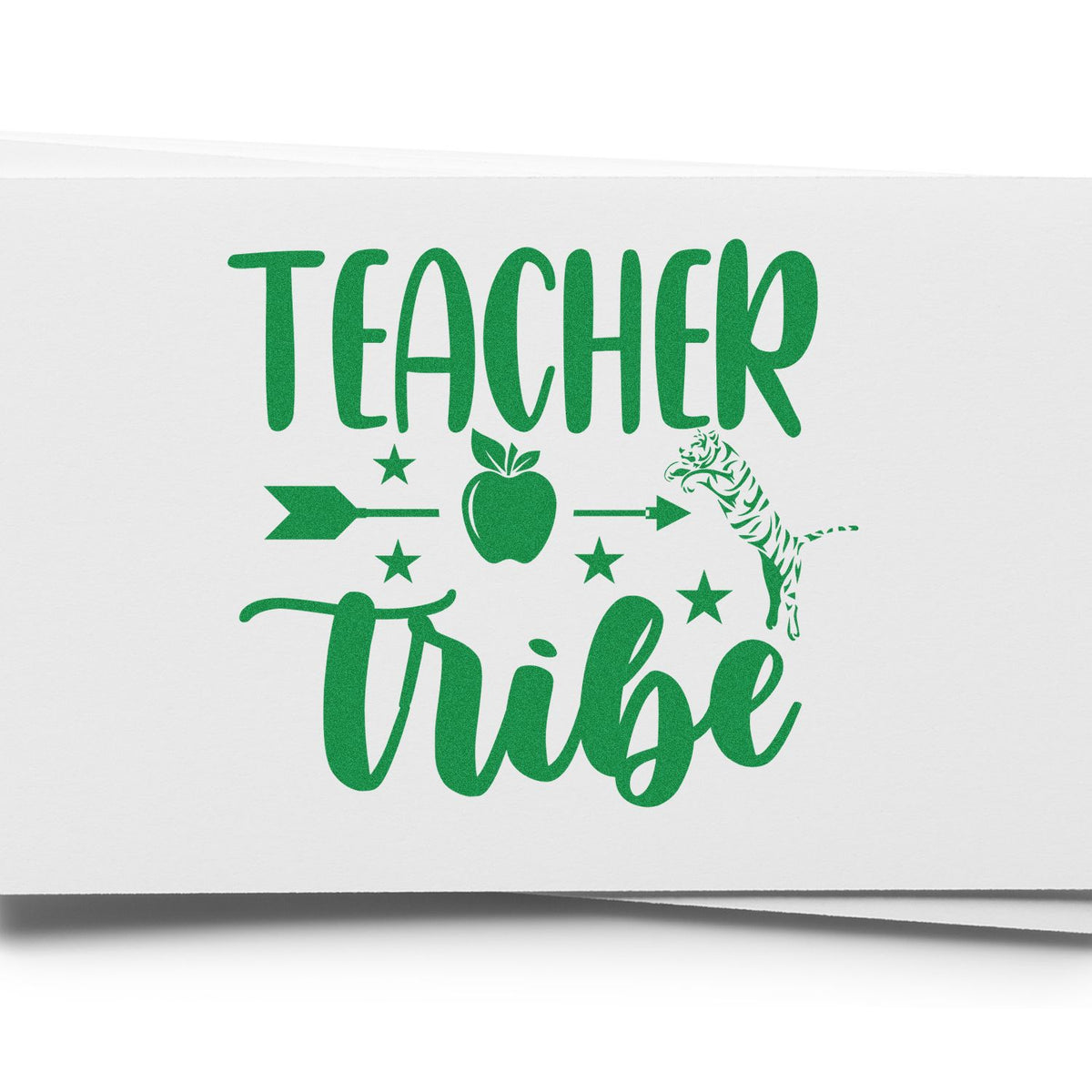 Green Teacher Tribe stamp design with apple, arrows, stars, and tiger seal on white paper.