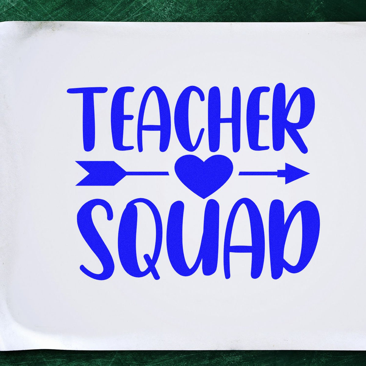 Blue Teacher Squad stamp seal with heart and arrows on white paper