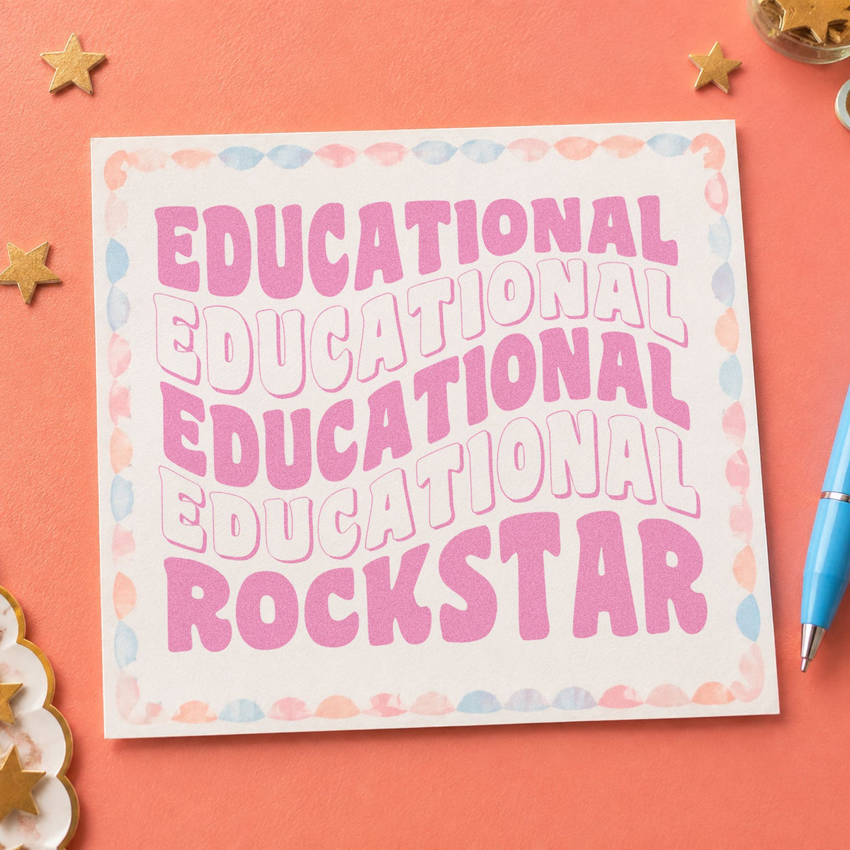 Educational Rockstar Repeated Waves craft stamp in purple ink on cardstock, an easy option for backstage pass tags.