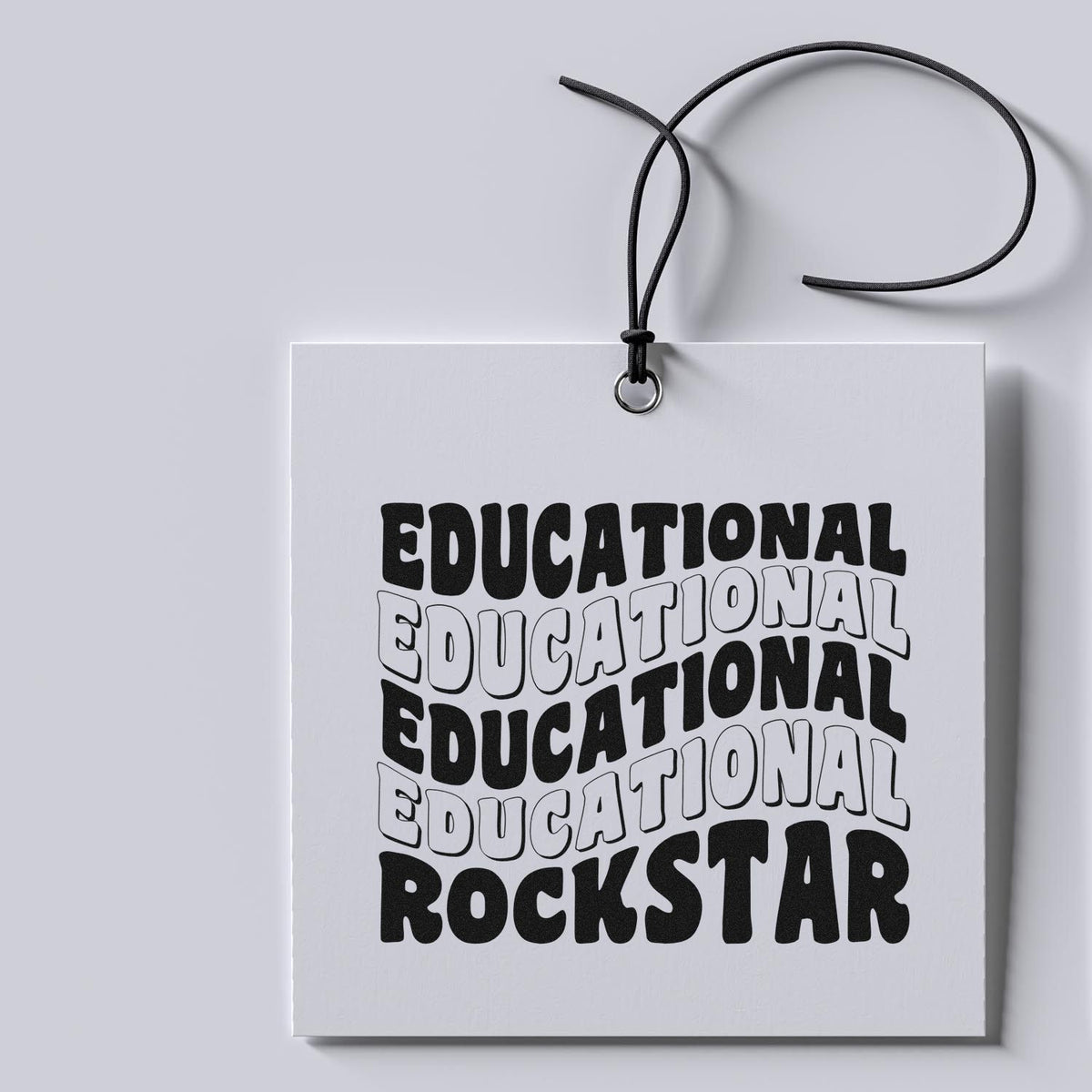 White hanging stamp and seal tag with black cord and bold black Educational Rockstar lettering.