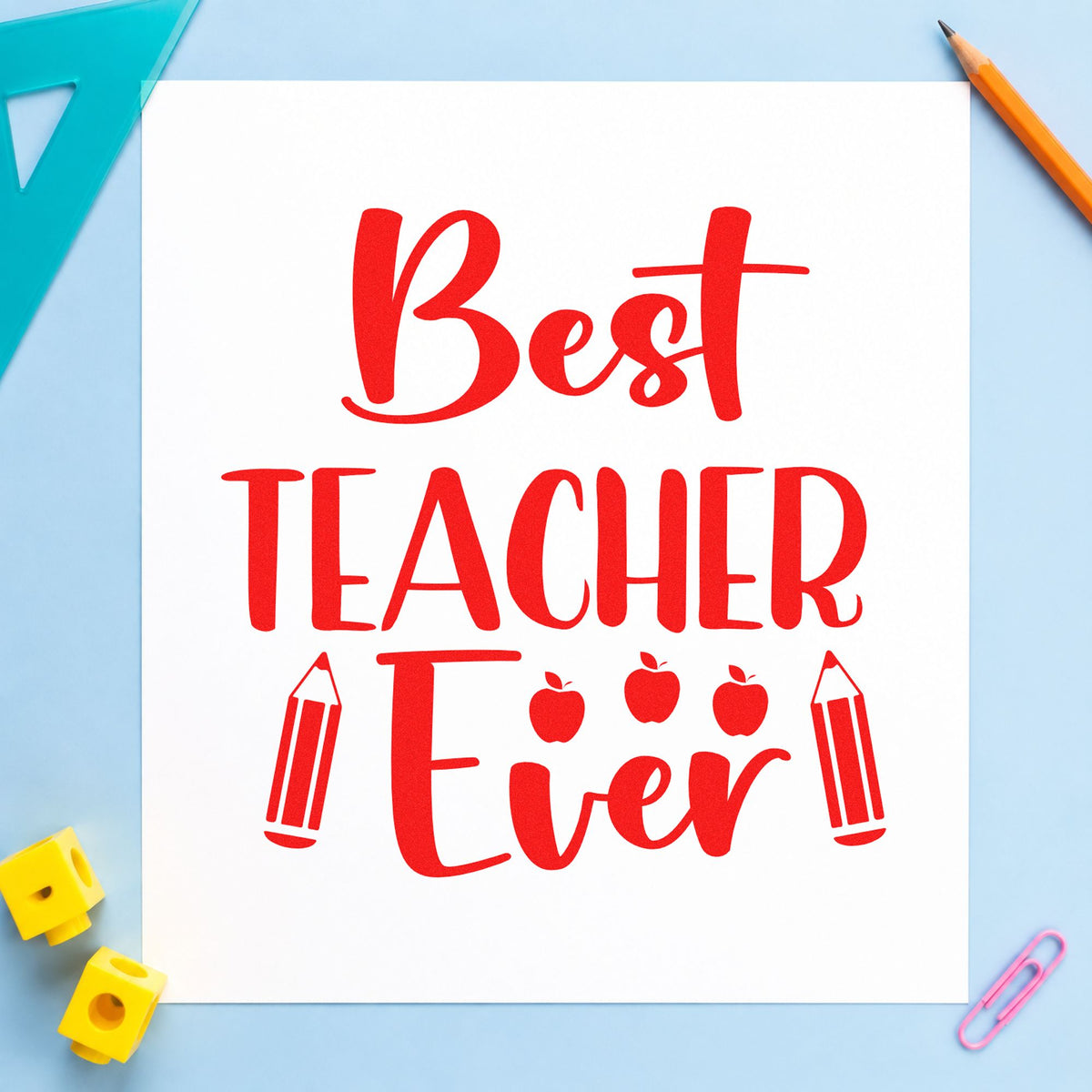 Best Teacher Ever Pencils rubber stamp shown in red ink, stamped for projects such as handover day notes.