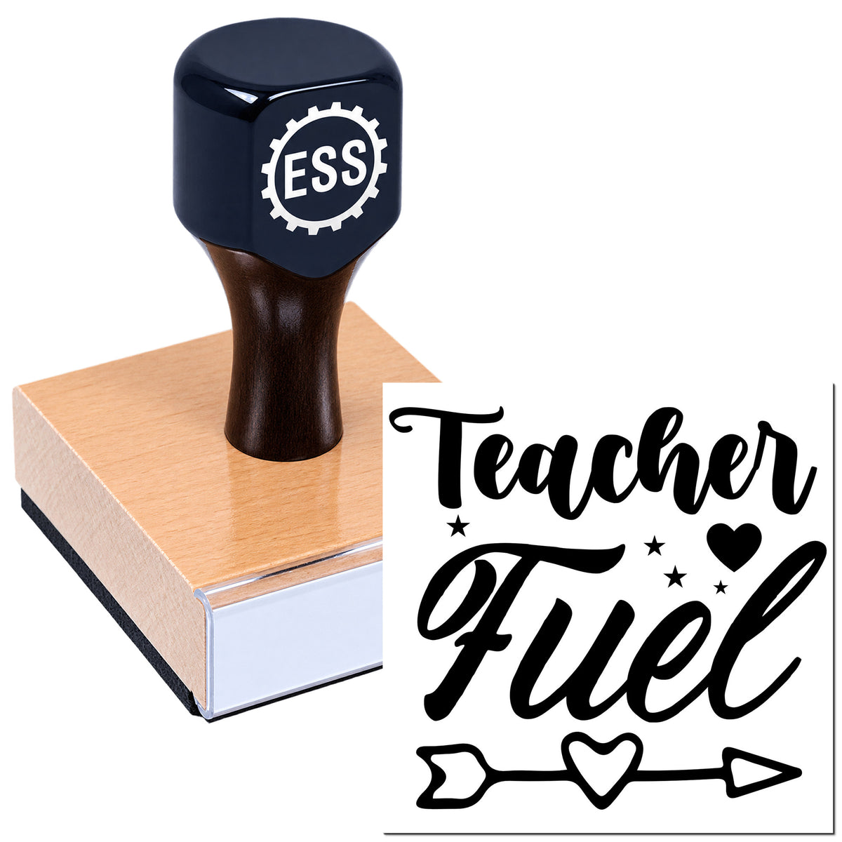 Black ESS seal stamp on wood block with white Teacher Fuel script, stars, heart and arrow design