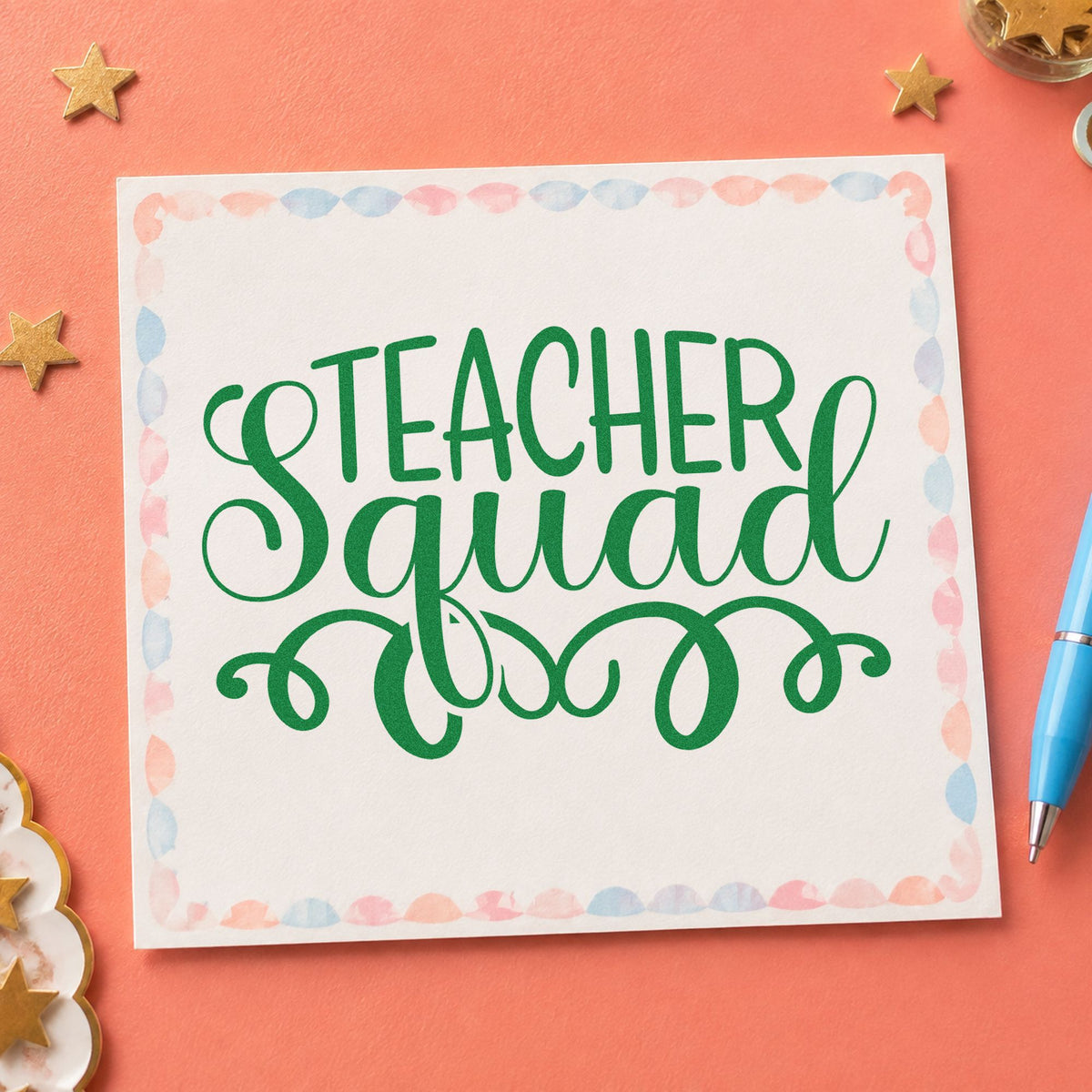 Teacher Squad Script Flourishes craft stamp imprint in green ink on a handmade project, one idea being menu fold pages.