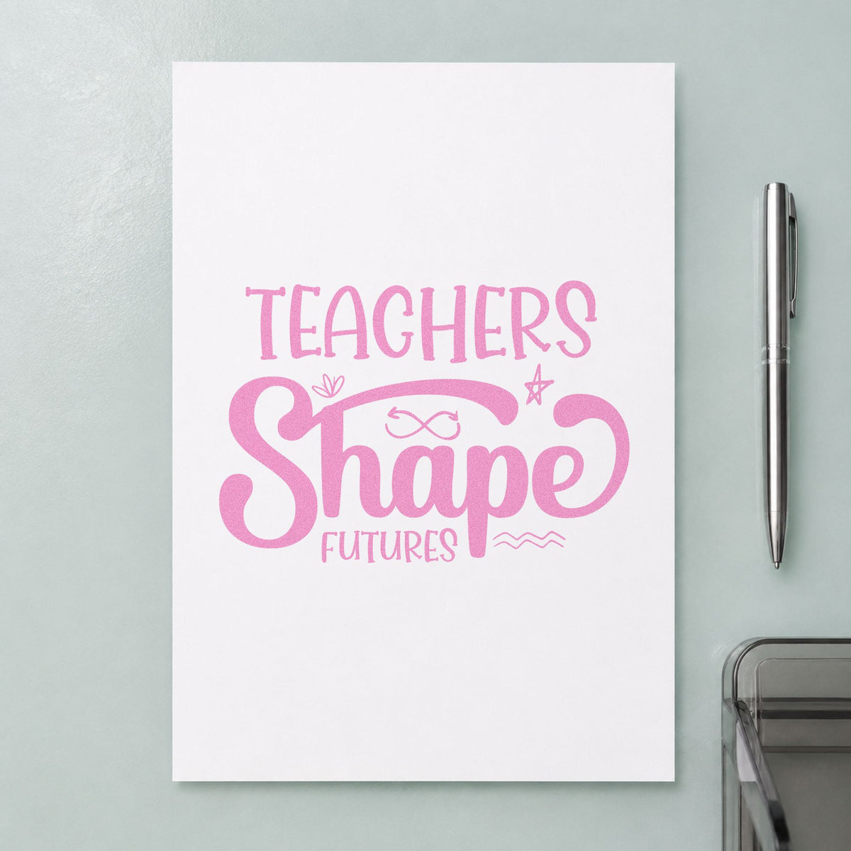 Teachers Shape Futures craft stamp in purple ink on cardstock, an easy option for handover year tags.