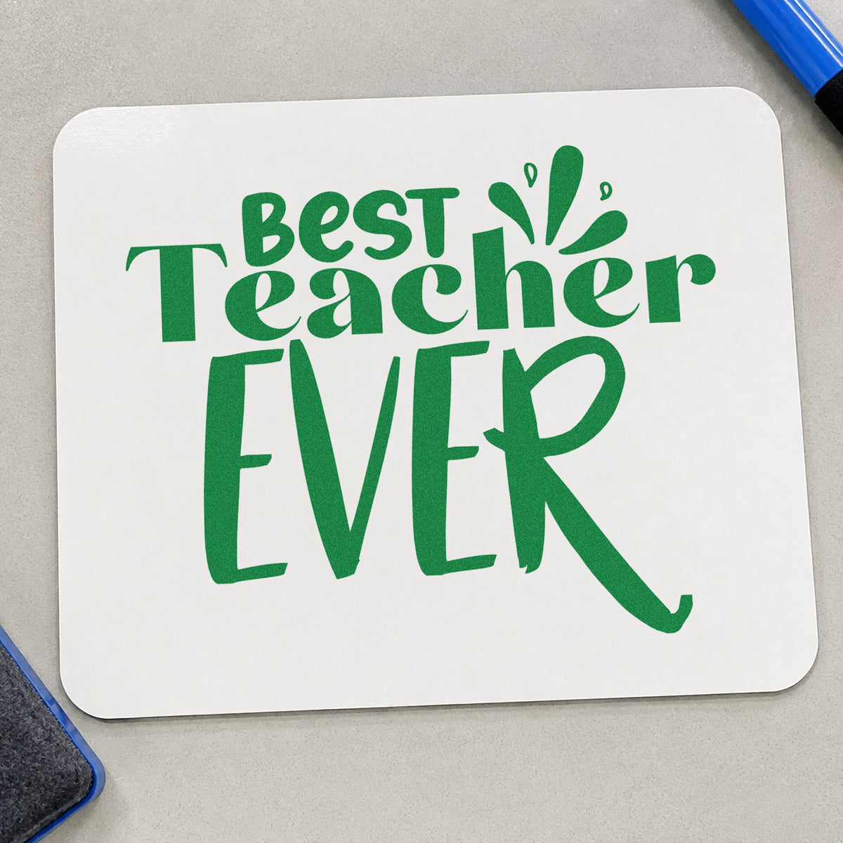 Best Teacher Ever Splash craft stamp imprint in green ink on a handmade project, one idea being framed studio hoard.
