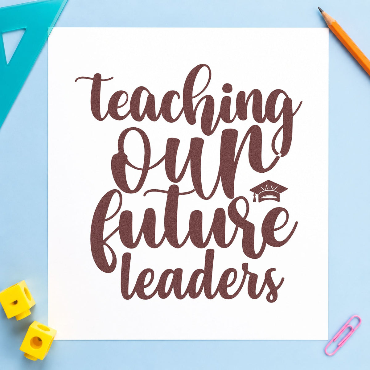 Teaching Our Future Leaders Cap rubber stamp printed in brown ink, ready for cap box labels and similar paper crafts.