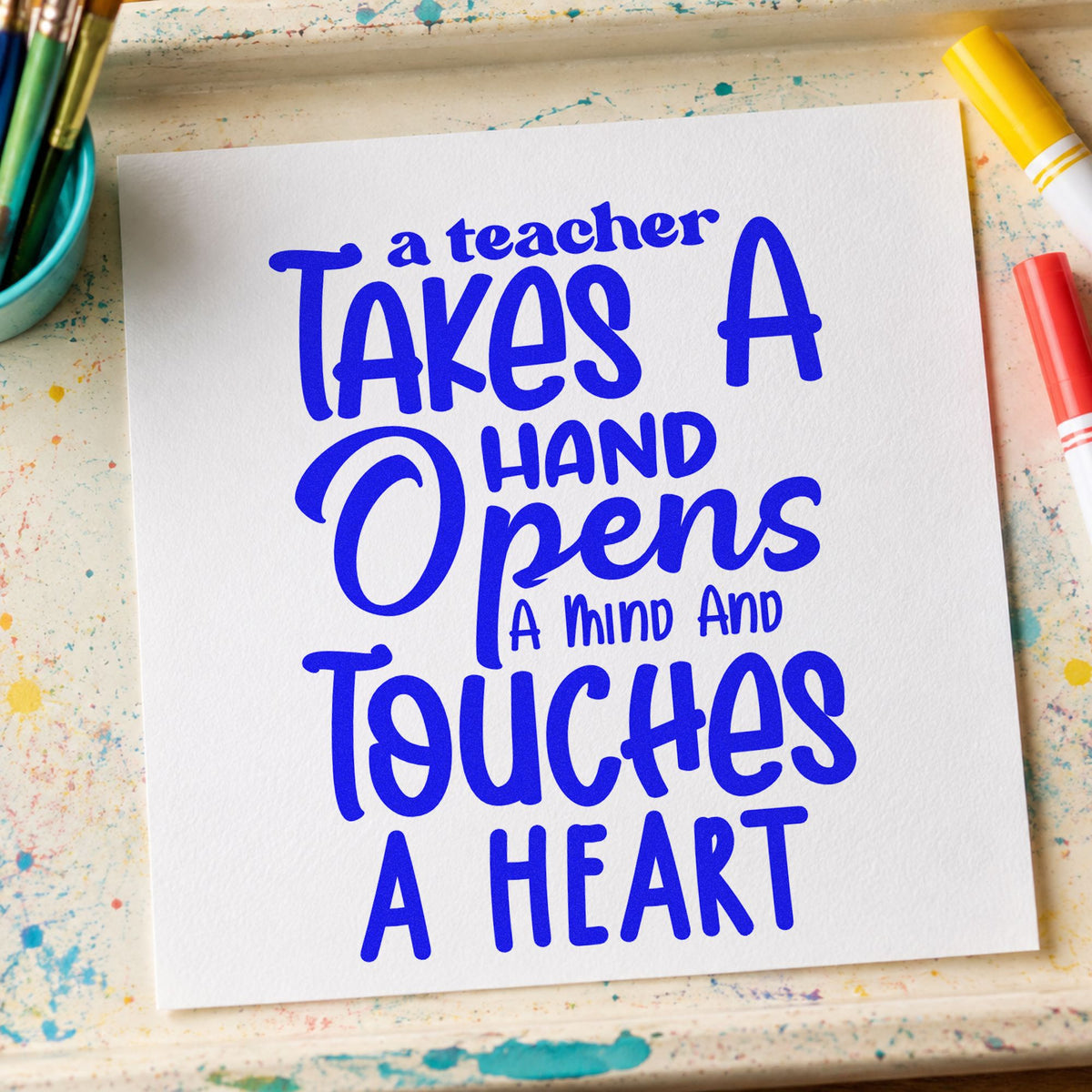 Teacher Takes Hand Opens Mind craft stamp imprinted in blue ink on paper, a design suited to donation seals.