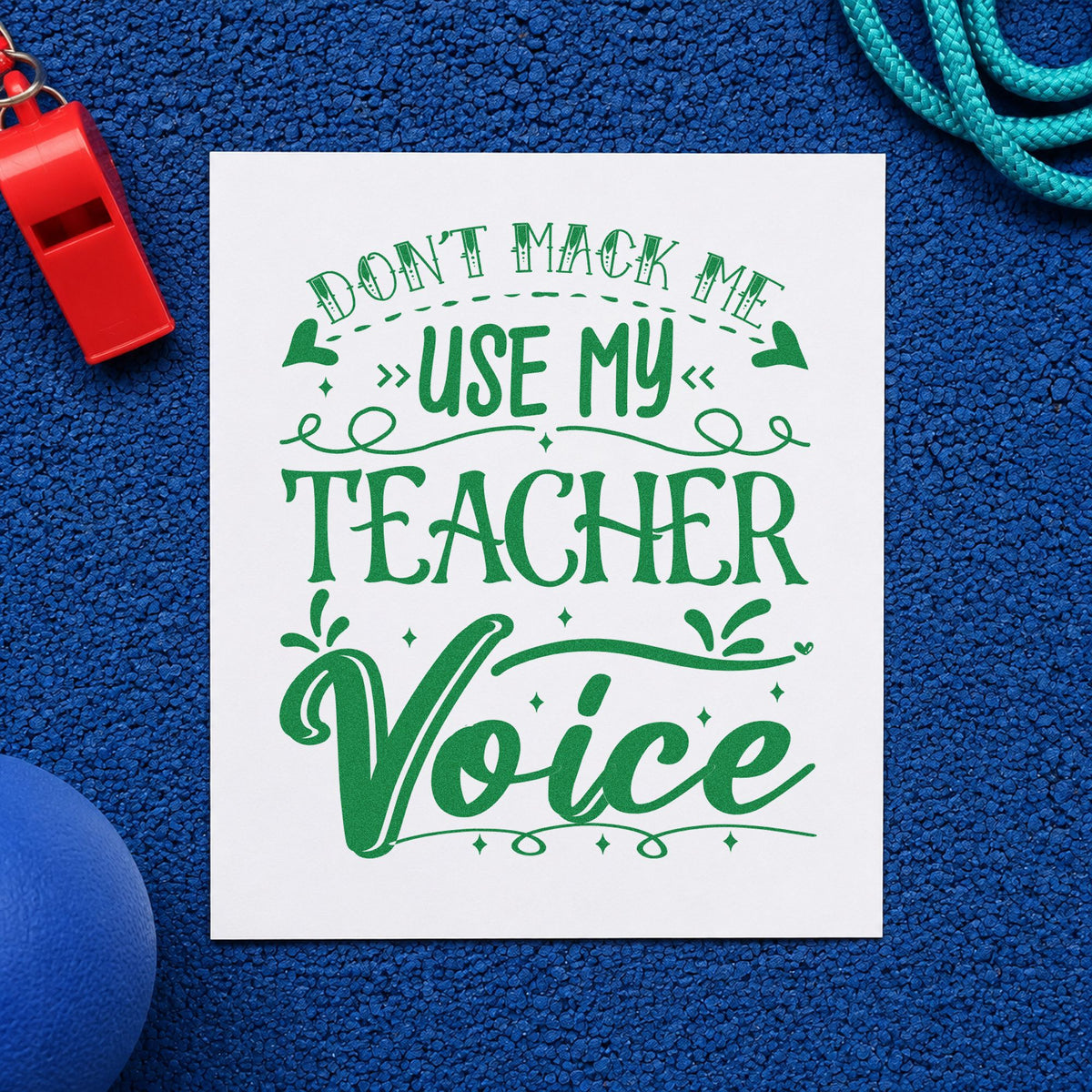 Don't Make Teacher Voice craft stamp imprint in green ink on a handmade project, one idea being voice warm pages.