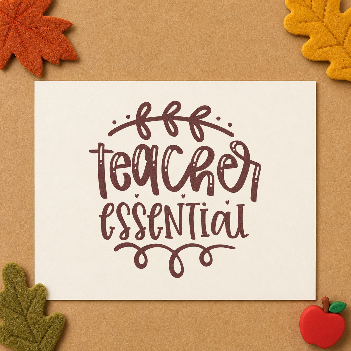Teacher Essential Leafy Flourish rubber stamp printed in brown ink, ready for pencil tin labels and similar paper crafts.