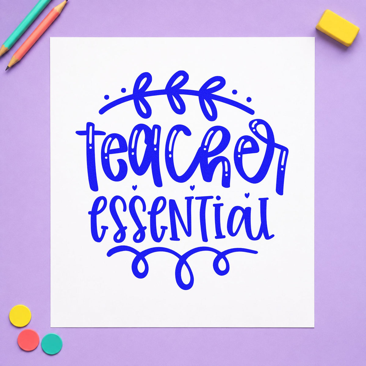Teacher Essential Leafy Flourish craft stamp in blue ink on cardstock, an easy option for satchel flap panels.