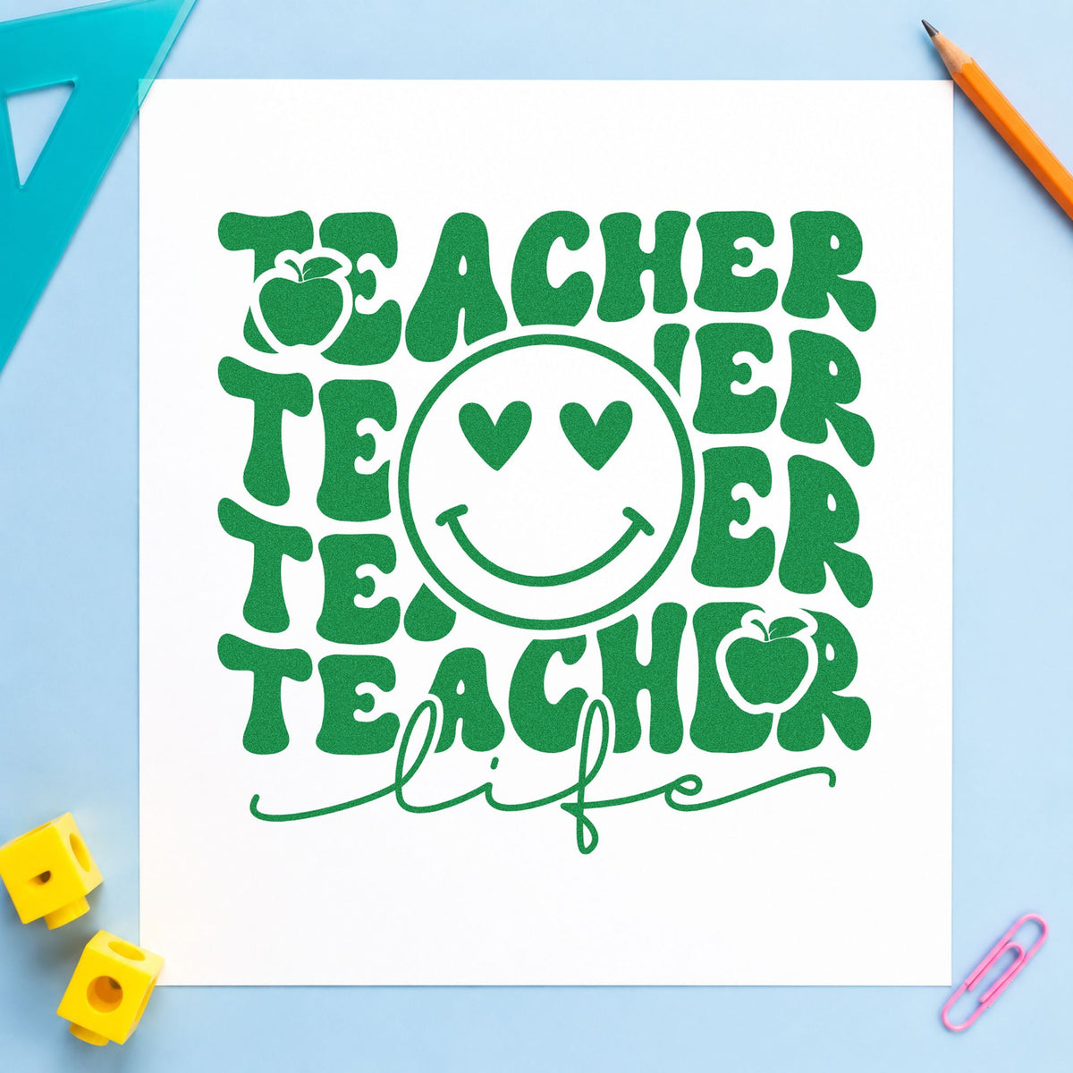 Teacher Life Smiley Repeat craft stamp imprint in green ink on a handmade project, one idea being mood check pages.