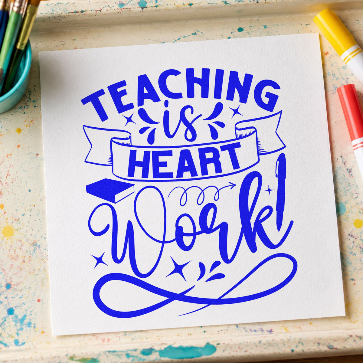 Teaching Is Heart Work craft stamp in blue ink on cardstock, an easy option for lectern cloth panels.