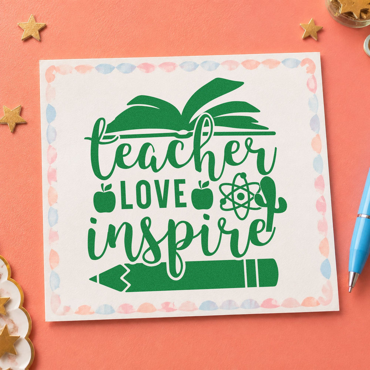Teacher Love Inspire Learning Icons craft stamp imprint in green ink on a handmade project, one idea being framed lab shelf.