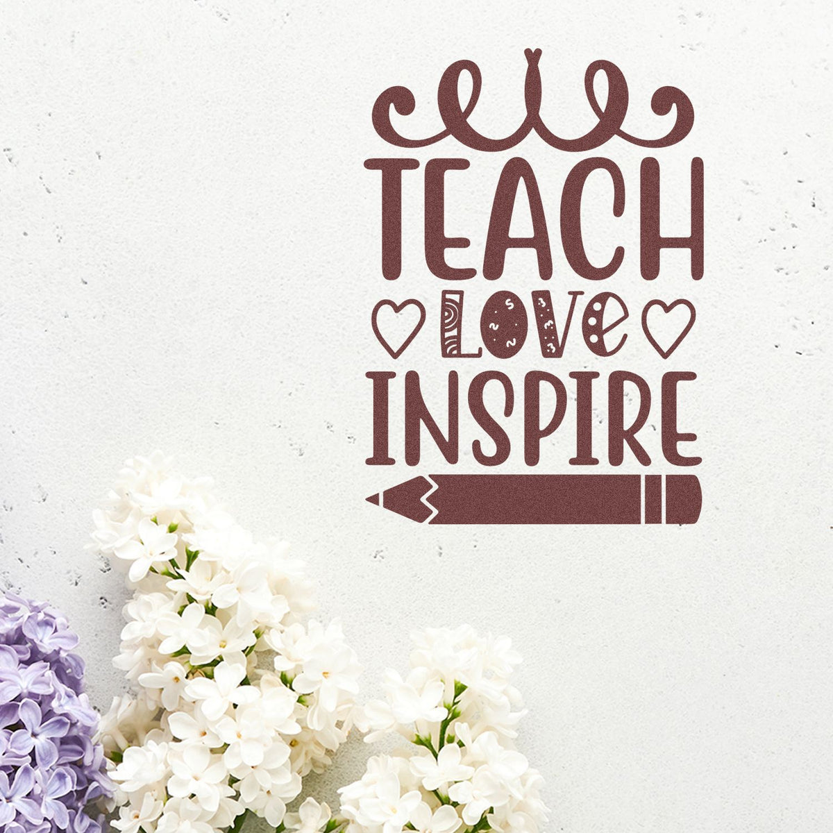 Burgundy Teach Love Inspire stamp and seal design with pencil, hearts, white background, and lilac-white flowers.