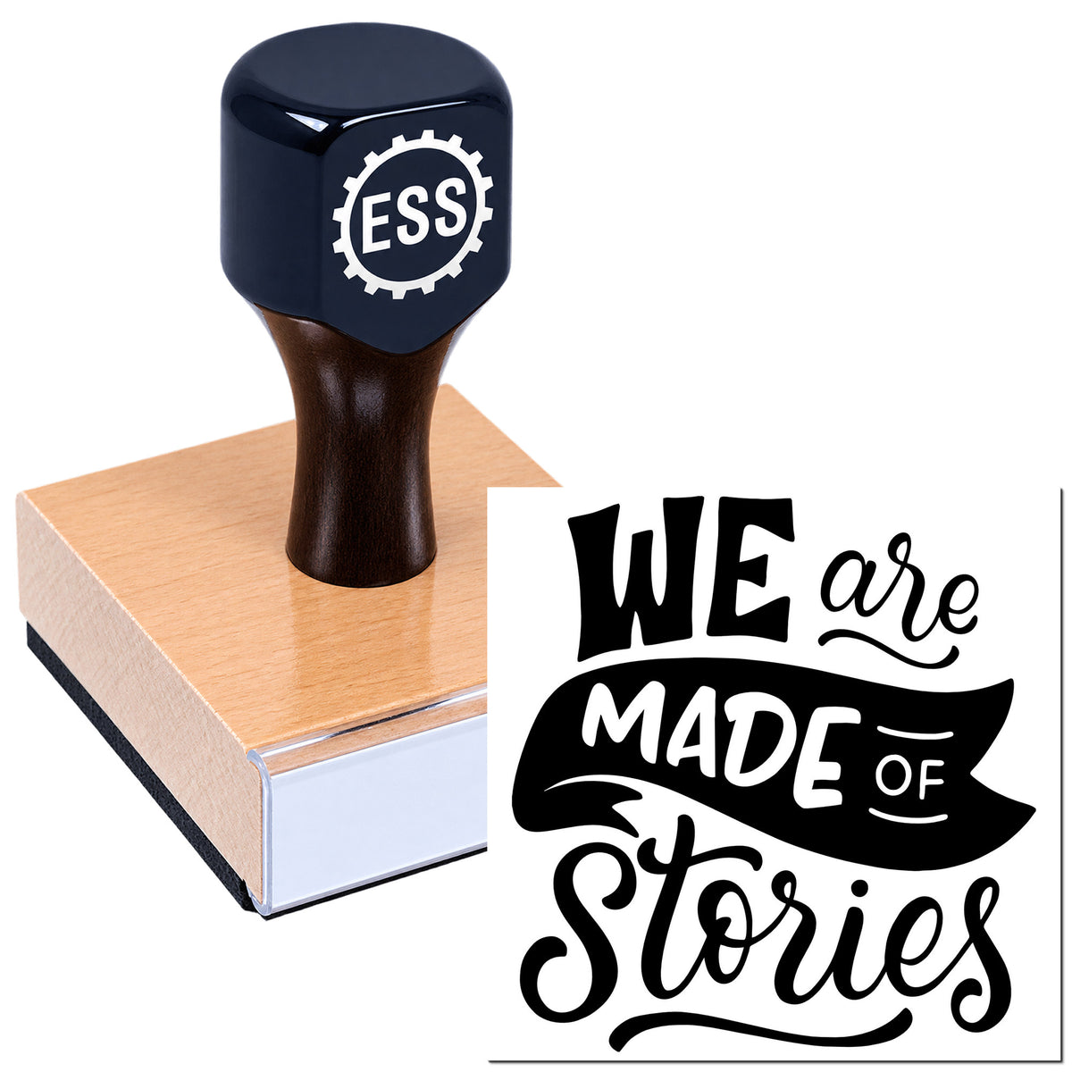 Navy rubber stamp and seal on a peach block, with ESS logo and "We are made of Stories" design.