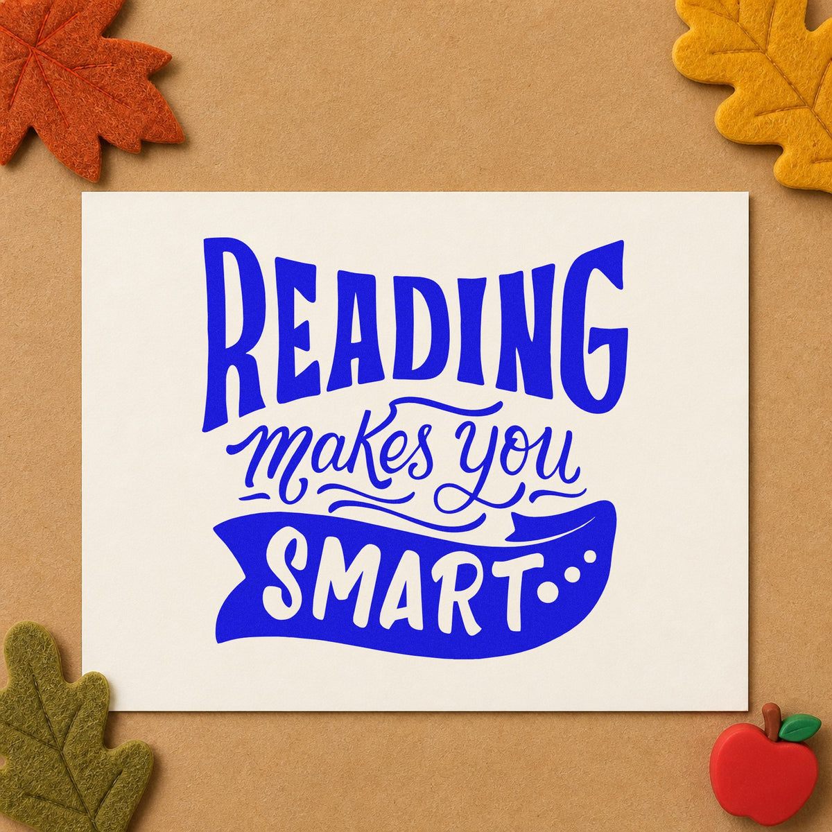 Reading Makes You Smart craft stamp in blue ink on cardstock, an easy option for book bag panels.
