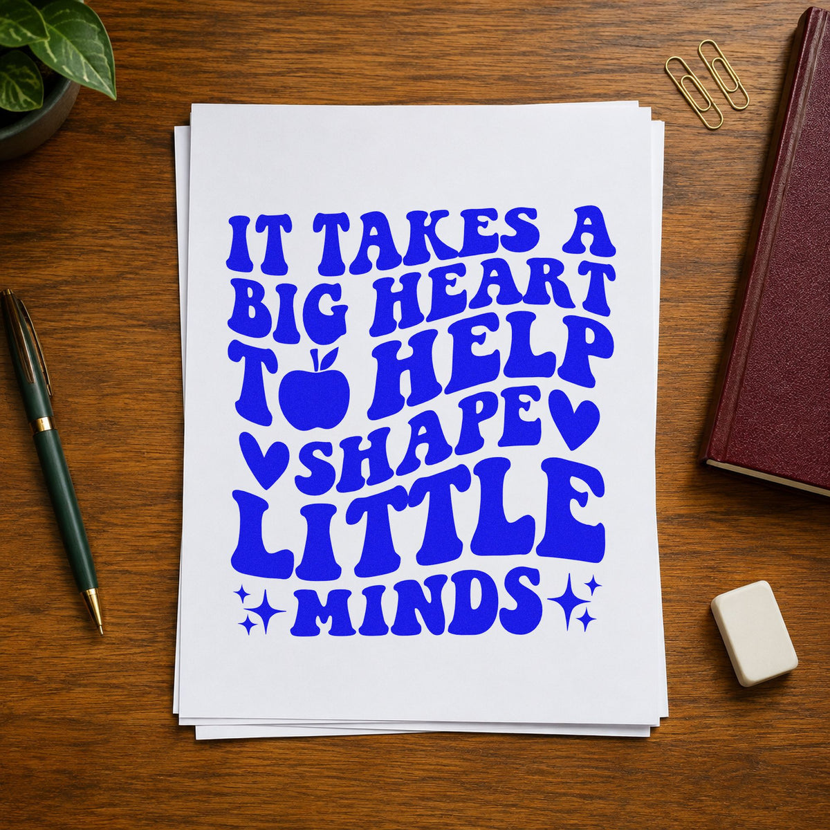 Big Heart Shape Little Minds craft stamp in blue ink on cardstock, an easy option for tabard trim panels.