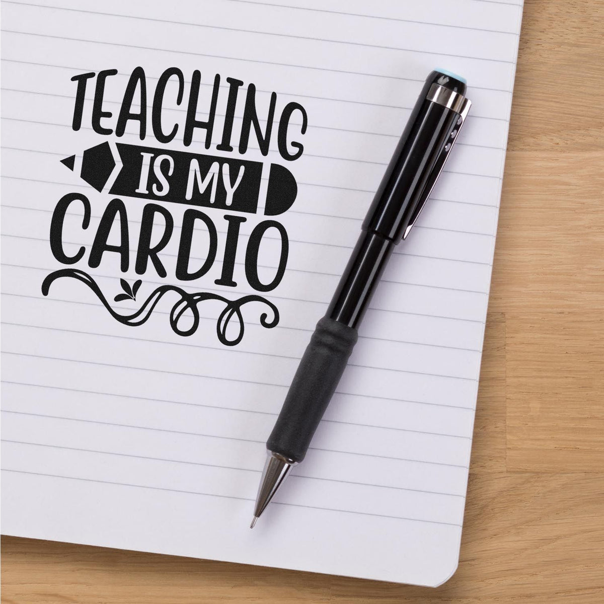 Black Teaching is my cardio stamp and seal design on lined notebook, with a black pen and decorative text.