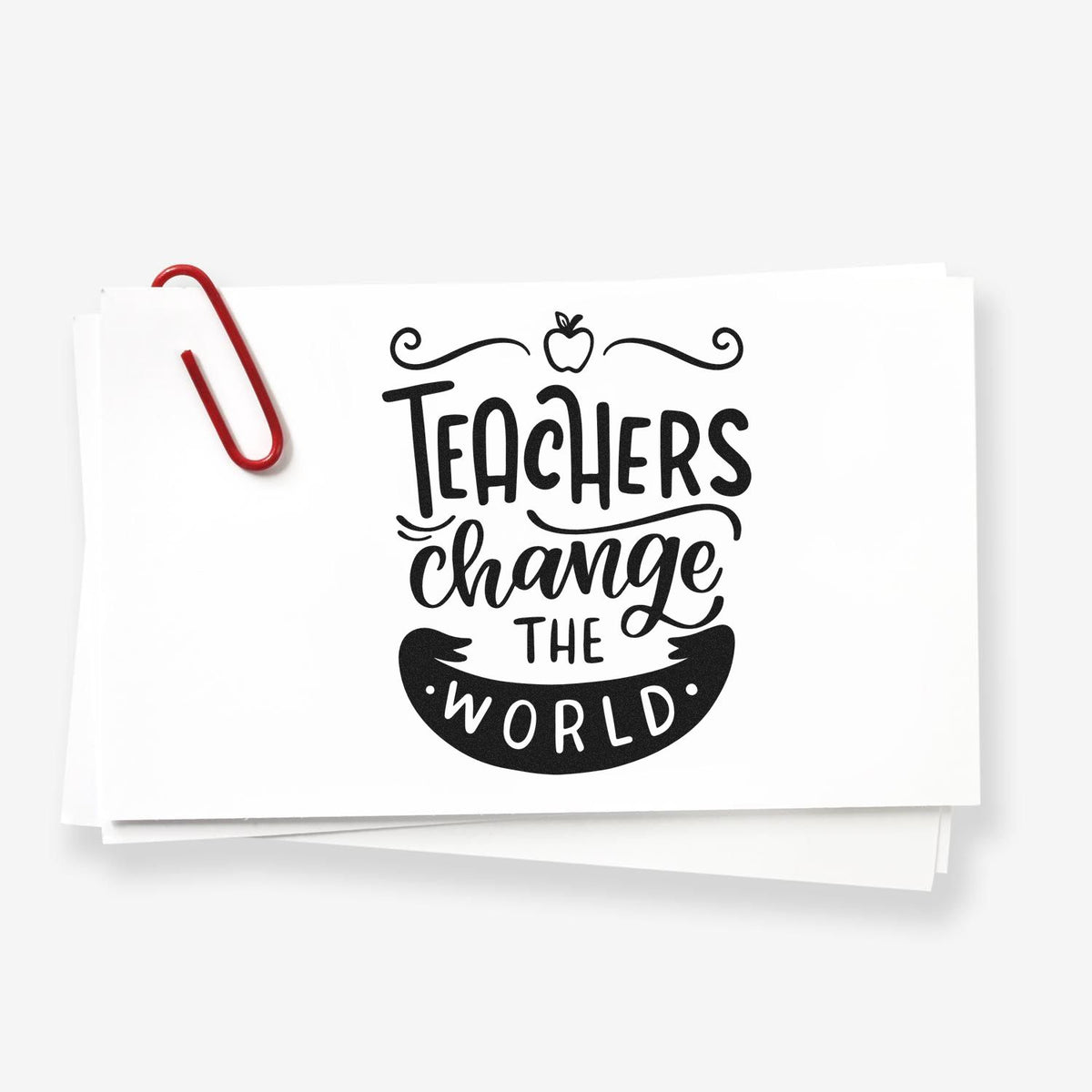 Black Teachers Change the World stamp on white cards with a red paperclip, featuring a teacher seal design.