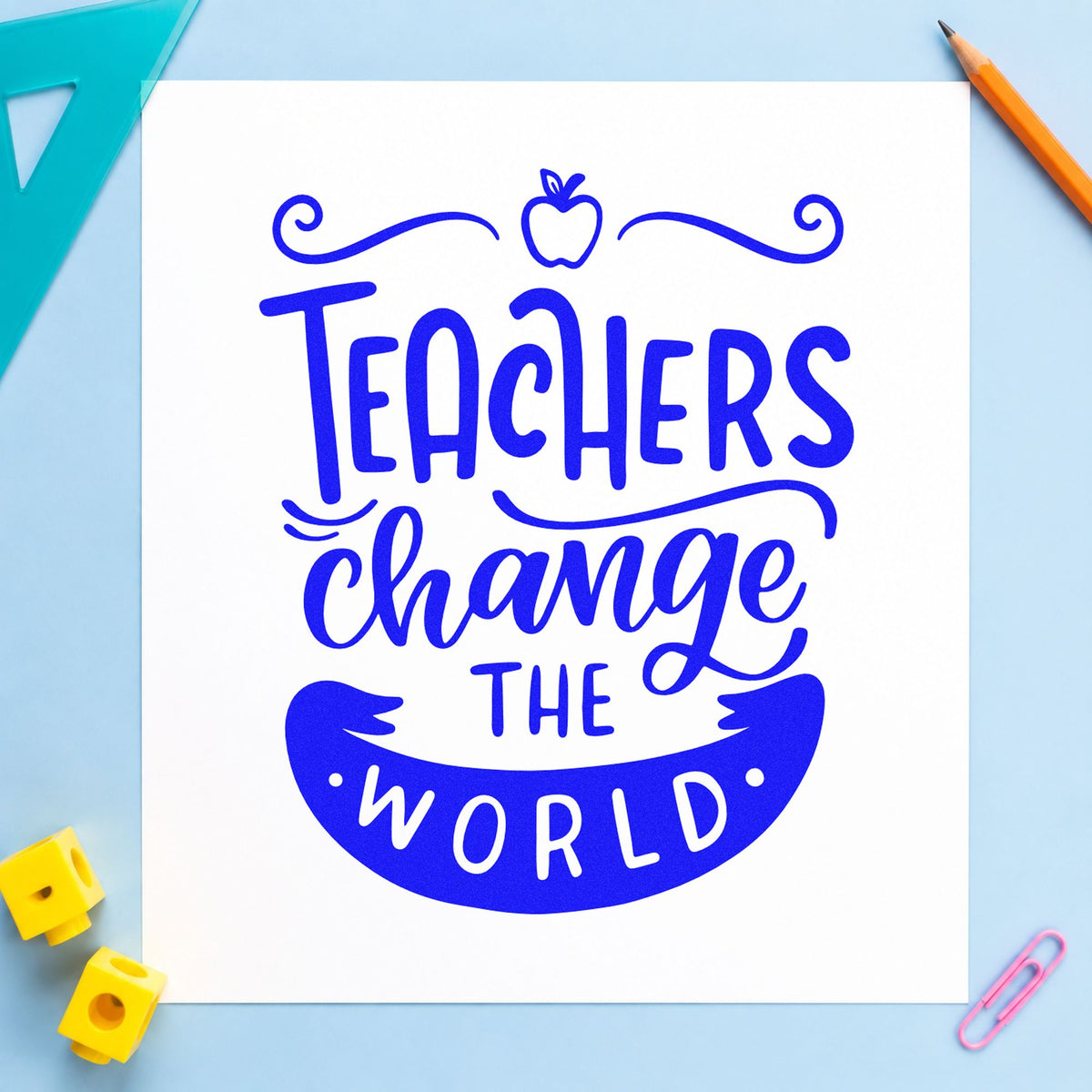 Teachers Change The World Apple craft stamp imprinted in blue ink on paper, a design suited to press pack seals.