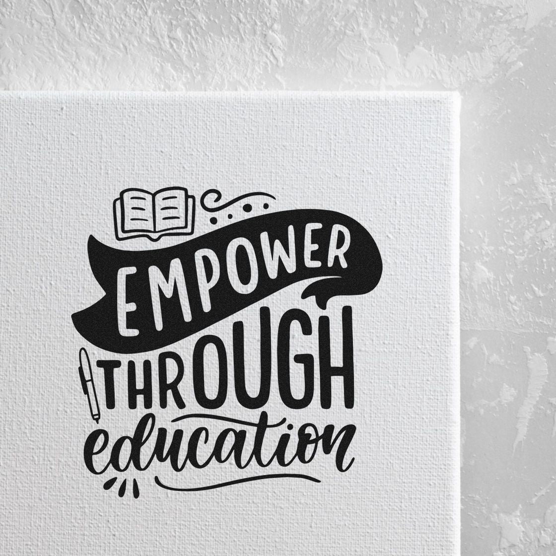 Black educational stamp design on white canvas, reading Empower Through Education with book and pen icons.